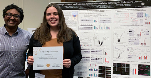 Pictured from left to right: Kapil V. Ramachandran, PhD (PI) with Best Poster Winner Victoria E. Paradise.